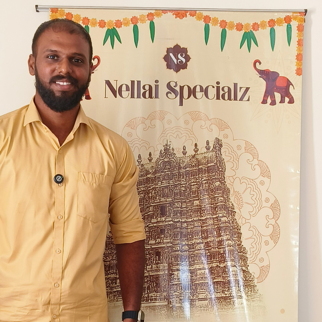 Nellai Specialz founder presenting the taste of Nellai